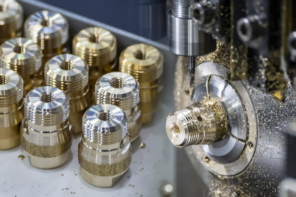 The abstract scene multi-tasking CNC lathe machine swiss type and pipe connector parts.